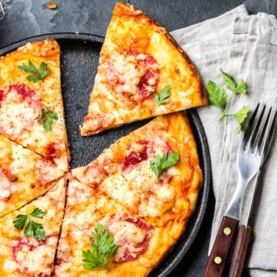homemade-pizza-with-salami-on-slate-2021-04-04-09-15-13-utc-500x500-1